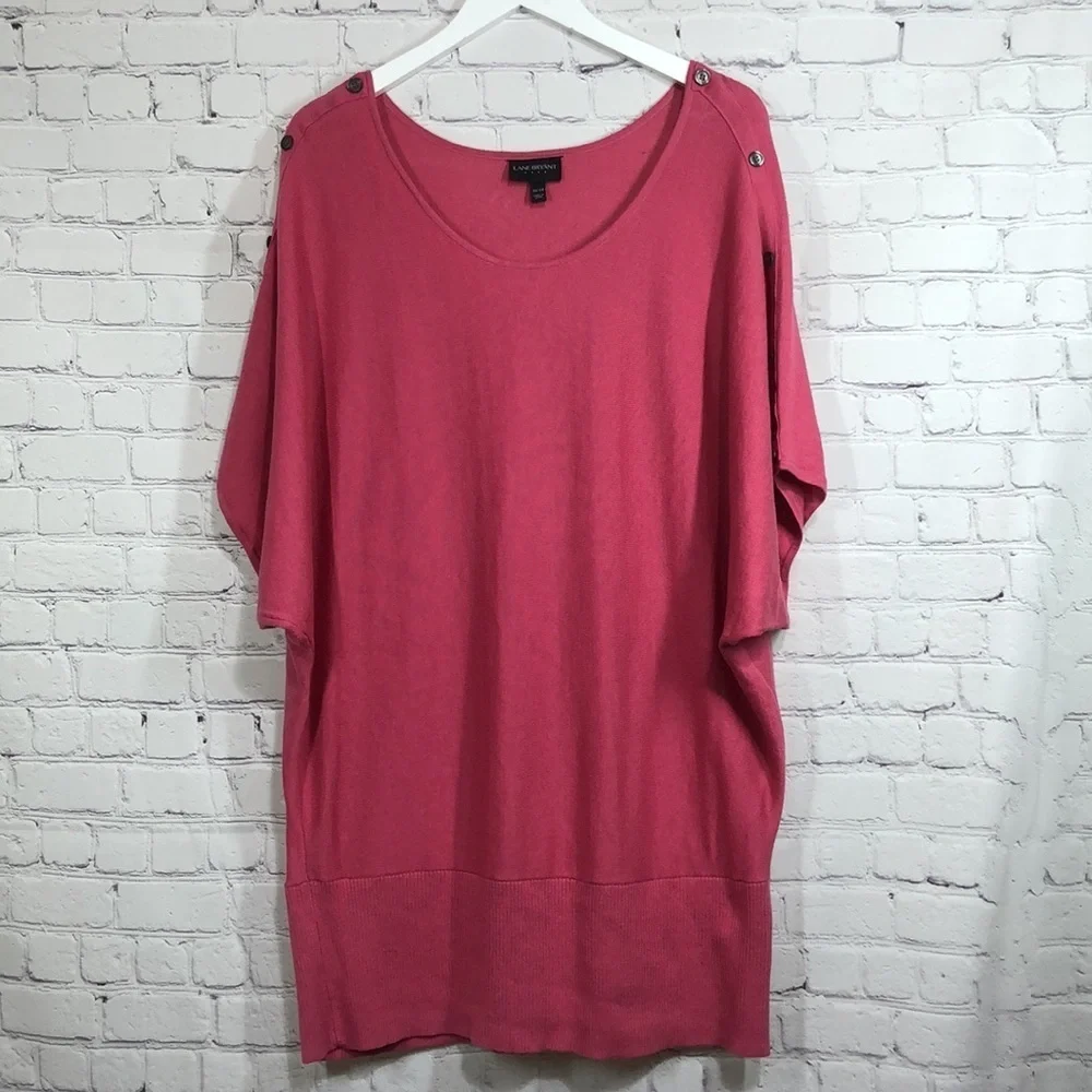 Lane Bryant pink top with buttons at the shoulders for design